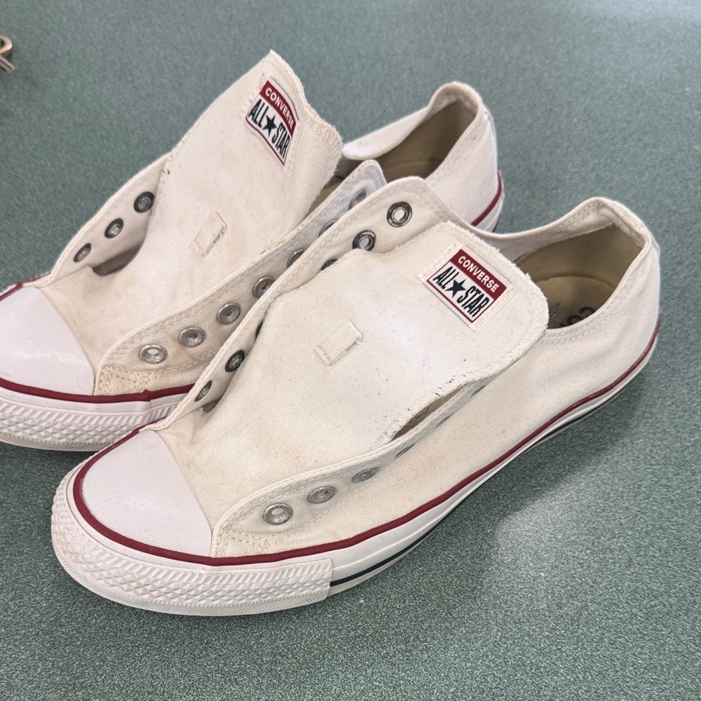 Converse Cream Slip-On Sneakers with Red Trim